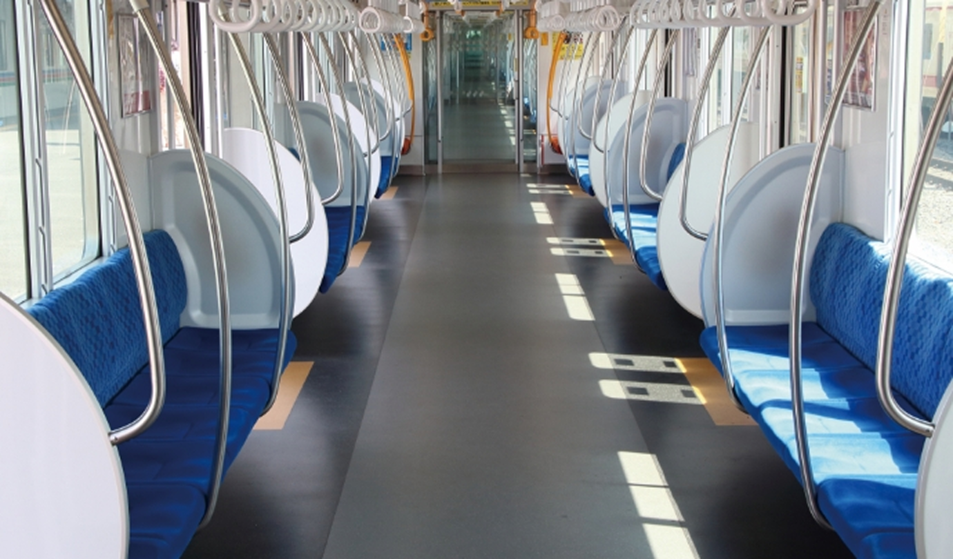 Interior aisle of a modern train showing potential panel applications